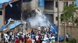 Scene outside outside a church following a blast in Kaduna, Nigeria, June 17, 2012.