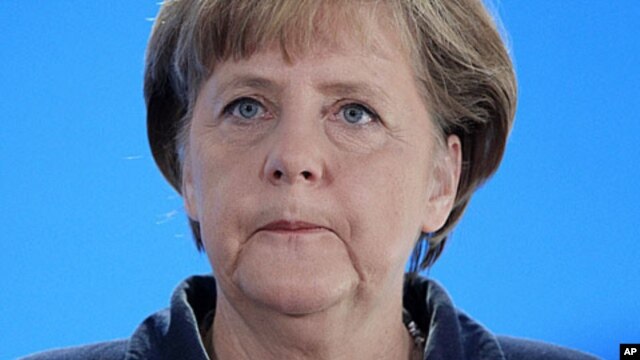 German Chancellor Angela Merkel speaks in Kiel, northern Germany, January 14, 2012.