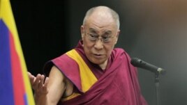 Tibetan spiritual leader the Dalai Lama delivers his speech during a seminar held by Japanese Diet members in Tokyo, Tuesday, Nov. 13, 2012. (AP Photo/Itsuo Inouye)