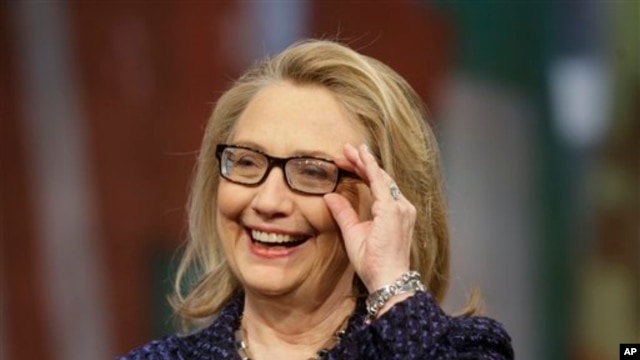 Secretary of State Hillary Rodham Clinton adjusts her glasses during a Global Townterview at the Newseum in Washington, January 29, 2013.