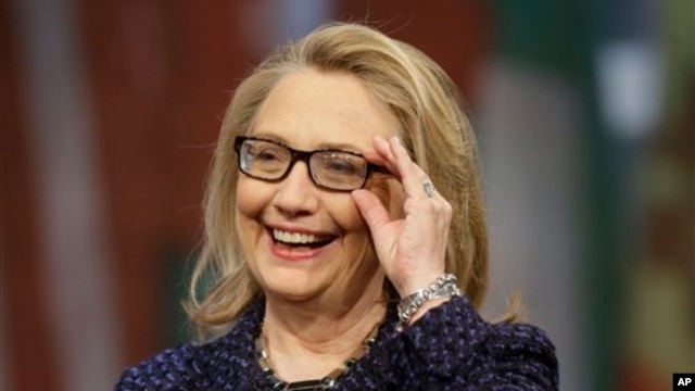 Secretary of State Hillary Rodham Clinton adjusts her glasses during a Global Townterview at the Newseum in Washington, January 29, 2013.