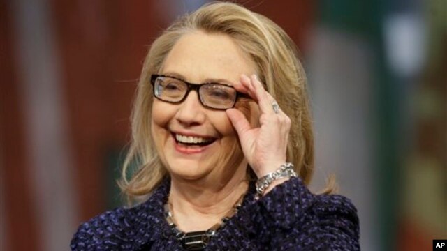 Secretary of State Hillary Rodham Clinton adjusts her glasses during a Global Townterview at the Newseum in Washington, January 29, 2013.