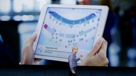 Apple CEO Tim Cook discusses the new iPad during the Apple event at the Bill Graham Civic Auditorium in San Francisco, California.