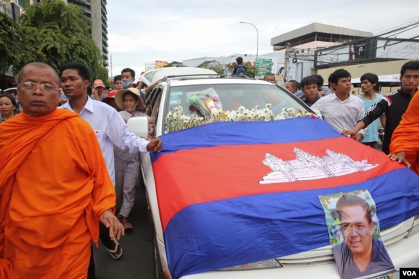 A procession of Kem Lei’s body on Preah Monivong Blvd in Phnom Penh in July 10th, 2016.