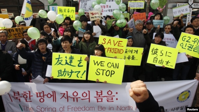 Protesters rally for North Korean defectors near the Chinese embassy in Seoul, March 3, 2012.