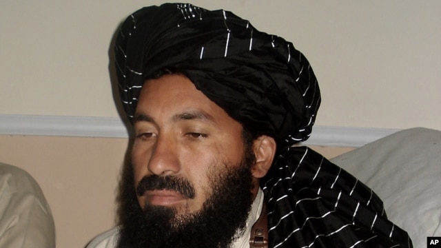 In this April, 20, 2007 photo, Pakistani militant commander Maulvi Nazir meets his associates in South Waziristan near the Afghani border.
