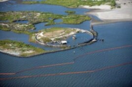 Crew aboard the motor vessel Poppa John train to deploy fire-resistant oil-containment boom off the coast of Venice, Louisiana.