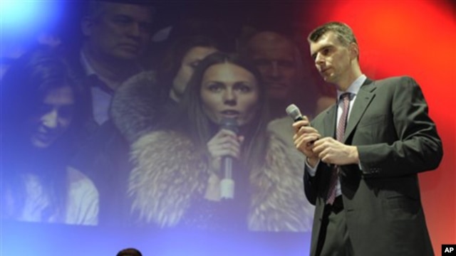 Russian billionaire and presidential candidate Mikhail Prokhorov meets with young voters in the Siberian city of Novosibirsk, Jan. 27, 2012.
