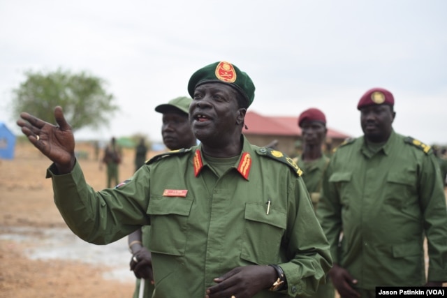 Rebel General James Koang speaks to the press at the rebels' base on the outskirts of Juba, South Sudan, April 7, 2016. The rebels are returning to secure the city ahead of the arrival of their leader, Riek Machar, on April 18.