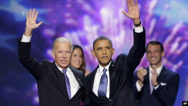 Vice President Joe Biden and President Barack Obama wave at the Democratic National Convention in Charlotte, North Carolina. 