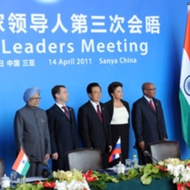 India's Prime Minister Manmohan Singh, Russia's President Dmitry Medvedev, China's President Hu Jintao, Brazil's President Dilma Rousseff and South Africa's President Jacob Zuma (L-R) pose during the BRICS (Brazil, Russia, India, China and South Africa) s