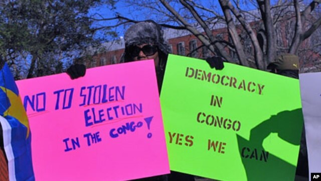 Protesters, like here at a recent rally outside the White House, have called for a new vote in the Democratic Republic of Congo.