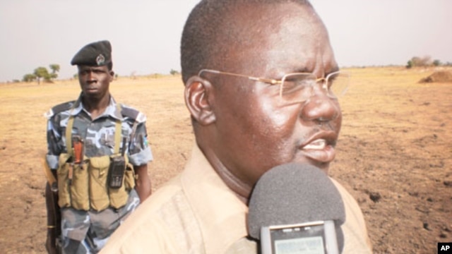 Guit County Commissioner of Unity State in South Sudan, James Puoy Yaka, talks to the press in Thaon village, April 12, 2012.