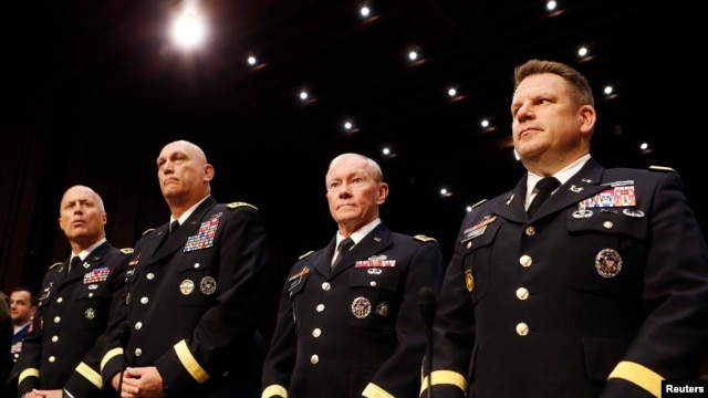 U.S. Army Generals stand ready to testify about pending legislation regarding sexual assaults in the military at a Senate Armed Services Committee on Capitol Hill in Washington, June 4, 2013. 