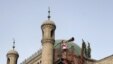 Imam calls Muslim Uighurs for afternoon prayer in China's Xinjiang region (2012 photo)