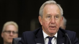 David Bagley, the head of compliance for London-based HSBC Holdings, reads an opening statement before a Senate investigative committee, "U.S. Vulnerabilities to Money Laundering, Drugs, and Terrorist Financing: HSBC Case History," on Capitol Hill in Wash