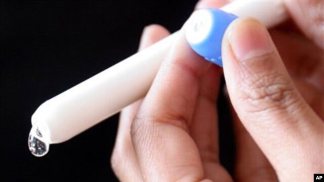 A drop of microbicide gel is photographed as it is squeezed from an applicator at the Baragwanath Hospital in Soweto, South Africa. The hospital took part in a large microbicide study called CAPRISA 004.