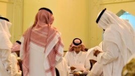 Saudi election officials count votes at the end of the municipal elections, on Dec. 12, 2015 in Jeddah.
