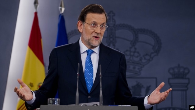 Spain's Prime Minister Mariano Rajoy speaks during a news conference at the Moncloa Palace in Madrid, Friday, Aug. 3, 2012.