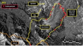 A satellite image of Ch’oma-Bong valley, North Korea, shows possible guard posts around Camp 14. (Digital Globe 2013)