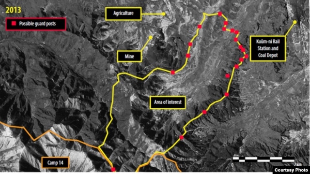 A satellite image of Ch’oma-Bong valley, North Korea, shows possible guard posts around Camp 14. (Digital Globe 2013)