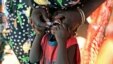 FILE - Displaced South Sudanese child receives oral cholera vaccine in a camp for internally displaced people in Juba, Feb. 2014.