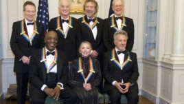 The 2012 Kennedy Center Honorees, from left, John Paul Jones, Buddy Guy, Jimmy Page, Natalia Makarova, Robert Plant, Dustin Hoffman, and David Letterman pose for a group photo Dec. 1, 2012 at the State Department in Washington.