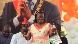 Simone Ehivet Gbagbo, wife of Laurent Gbagbo, attends a rally at the Culture Palace in Abidjan, January 15, 2011.
