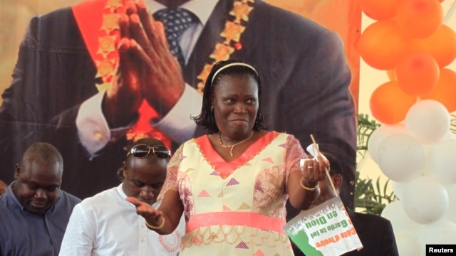 Simone Ehivet Gbagbo, wife of Laurent Gbagbo, attends a rally at the Culture Palace in Abidjan, January 15, 2011.