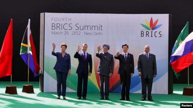 A Mar. 29, 2012 photo shows (L-R) Brazil's President Dilma Rousseff, Russian Pres. Dmitry Medvedev, Indian PM Manmohan Singh, former Chinese Pres. Hu Jintao and South African Pres. Jacob Zuma at the BRICS Summit in New Delhi, India.