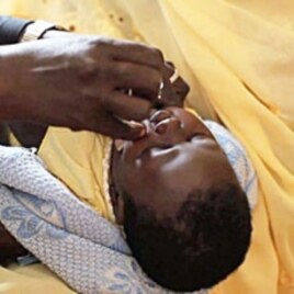 A Sudanese child receives the rotavirus vaccine.
