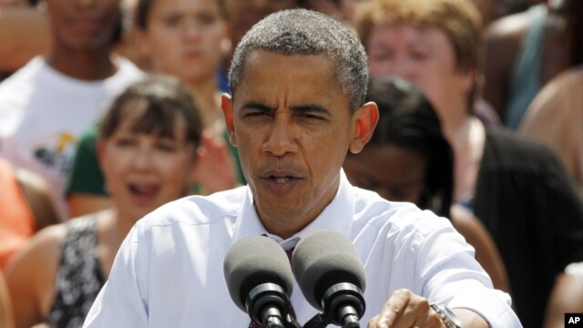 President Barack Obama gestures during a rally at Norfolk State University in Norfolk, Virginia, Tuesday, Sept. 4, 2012.
