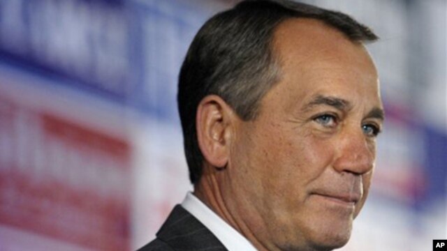 House Republican leader John Boehner of Ohio celebrates the GOP's victory that changes the balance of power in Congress and will likely elevate him to speaker of the House, during an election night gathering hosted by the National Republican Congressional