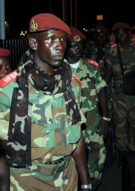 Soldiers from Central African Republic's Seleka rebel group arrive at the airport ahead of planned peace talks with the Central African Republic's government, Libreville, Gabon, Jan. 7, 2013.