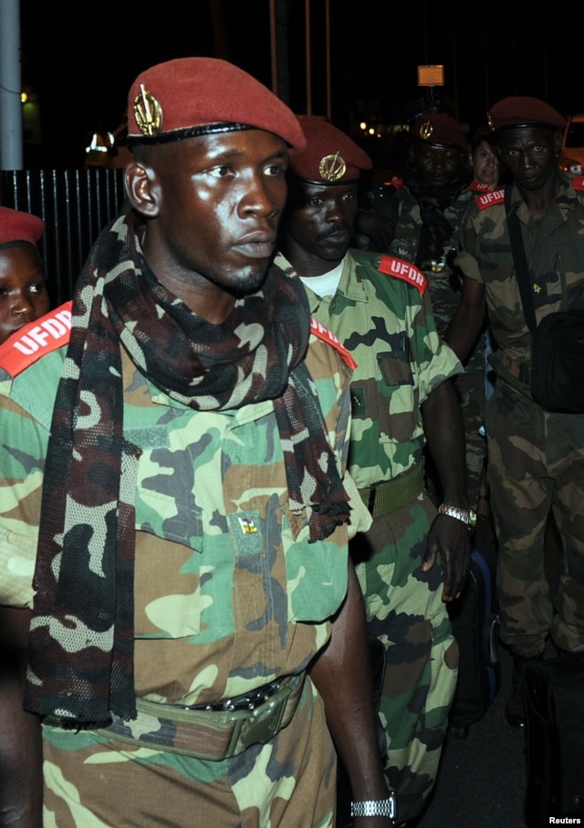 Soldiers from Central African Republic's Seleka rebel group arrive at the airport ahead of planned peace talks with the Central African Republic's government, Libreville, Gabon, Jan. 7, 2013.
