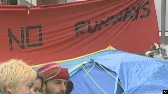 Demonstrators protest further expansion of London's Heathrow Airport
