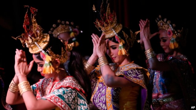 FILE - Thai student actress perform at Thai traditional “Khon” theater in Bangkok, March 22, 2016.