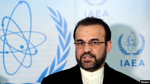 FILE - Iran's ambassador to the International Atomic Energy Agency (IAEA) Reza Najafi attends a news conference at the headquarters of the IAEA in Vienna, Dec. 11, 2013.
