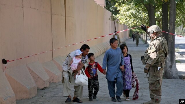 Hiệp định cho phép một số binh sĩ của Mỹ và của liên minh NATO lưu lại Afghanistan sau ngày 31/12.