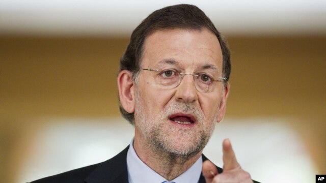 Spain's Prime Minister Mariano Rajoy speaks during a press conference at the Moncloa Palace, in Madrid, June 10, 2012.