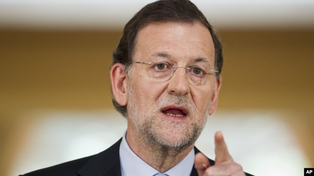 Spain's Prime Minister Mariano Rajoy speaks during a press conference at the Moncloa Palace, in Madrid, June 10, 2012.
