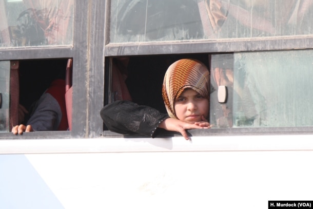 Women fleeing Mosul say IS forces girls as young as seven years old to wear headscarves for modesty in Gogjali, Mosul, Iraq, Nov. 7, 2016.