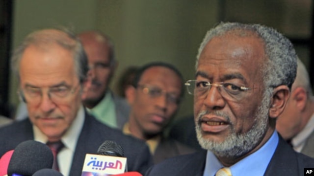 Sudan's Foreign Minister Ali Karti (R) speaks during a joint news conference with newly appointed U.S. special envoy for Sudan Princeton Lyman, in Khartoum, April 6, 2011