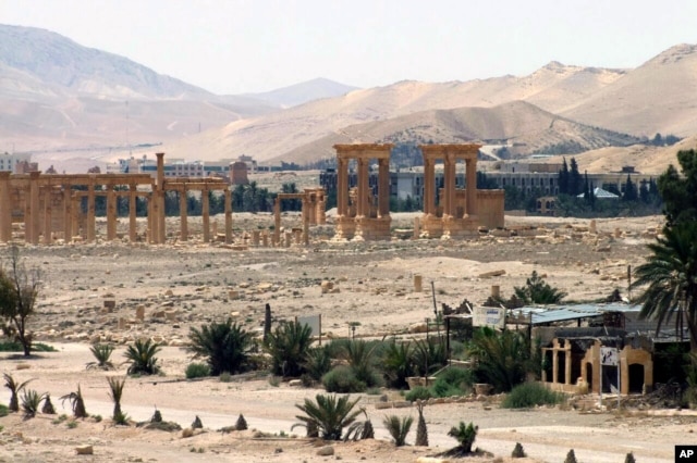 FILE - This file photo released May 17, 2015, by the Syrian official news agency SANA, shows the general view of the ancient Roman city of Palmyra, northeast of Damascus, Syria.