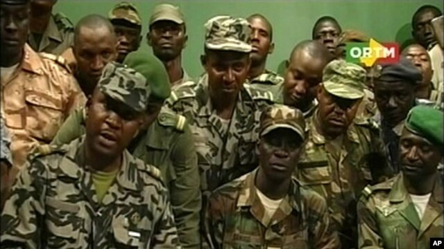 Renegade Malian soldiers appear on television at the ORTM television studio in Bamako, March 22, 2012 still image taken from video. 