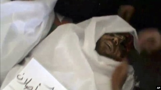 Image from amateur video purports to show body of man killed by Syrian regime forces in Idlib, June 5, 2012.