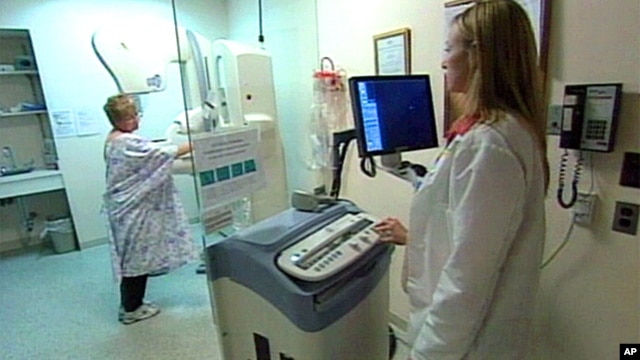 Woman taking mammogram test