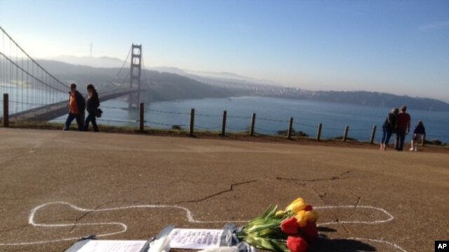 A chalk outline of a body is seen near the Golden Gate bridge in San Francisco.