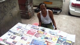 Newspaper Seller Oo Zay Yar, says all of Burma welcomes President Barack Obama's visit because of the hope he can spur economic, social, and political developments, Rangoon, Burma, November 12, 2012. (D. Schearf/VOA)