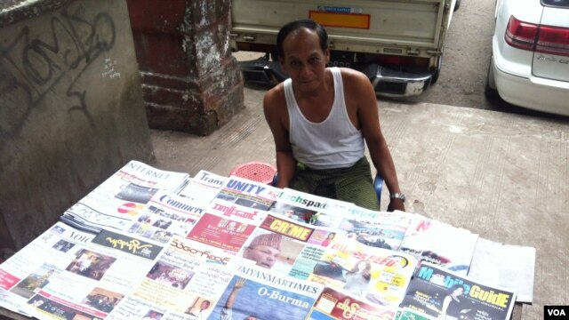 Newspaper Seller Oo Zay Yar, says all of Burma welcomes President Barack Obama's visit because of the hope he can spur economic, social, and political developments, Rangoon, Burma, November 12, 2012. (D. Schearf/VOA)